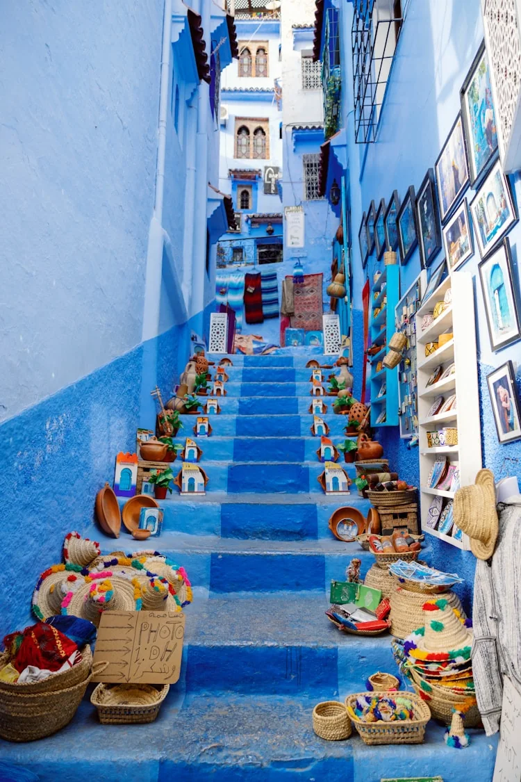Blue steps and flower pots in Chefchaouen