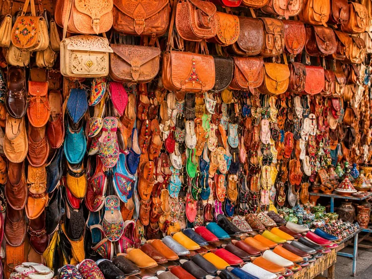 Moroccan leather bags and woven goods in a souk