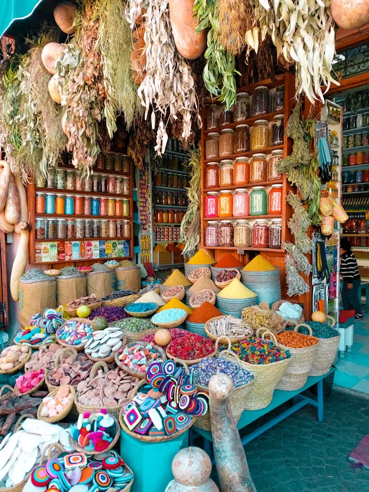 Moroccan pottery and craft objects displayed in a market