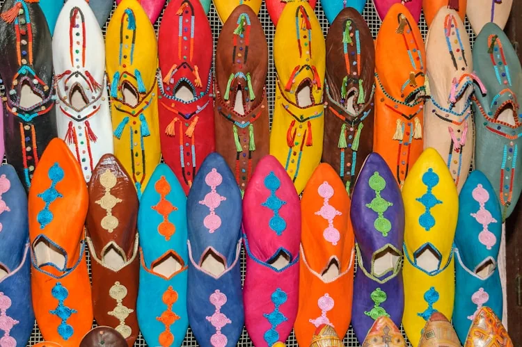 Colourful Moroccan slippers arranged in a craft stall