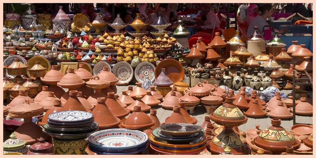 Moroccan ceramics and tagines in a market display