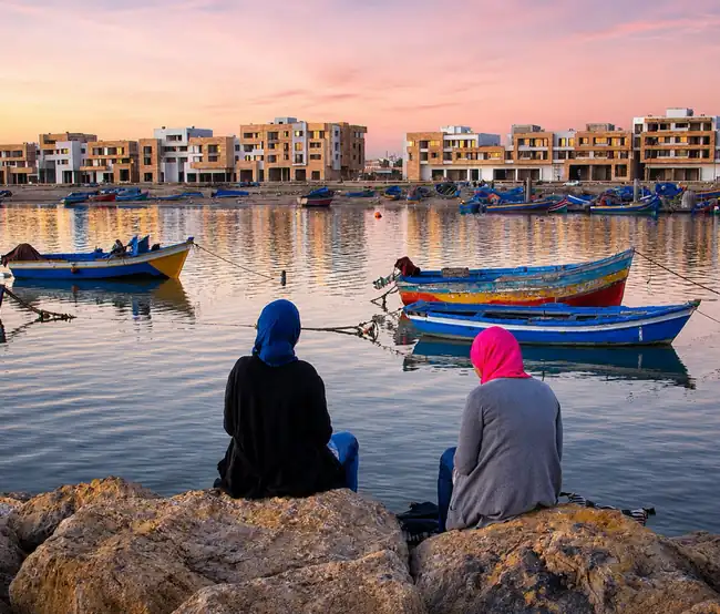 Everyday life beside the Bouregreg fishing boats