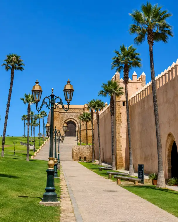 Path, palm trees and fortified walls at the Kasbah of the Oudaias in Rabat