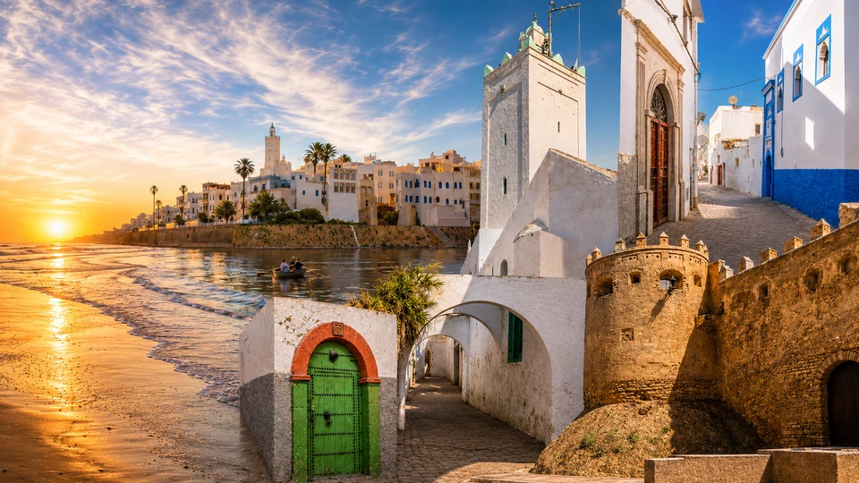 Azemmour riverfront medina, Oum Er-Rbia, white walls, green door, ramparts and Atlantic sunset
