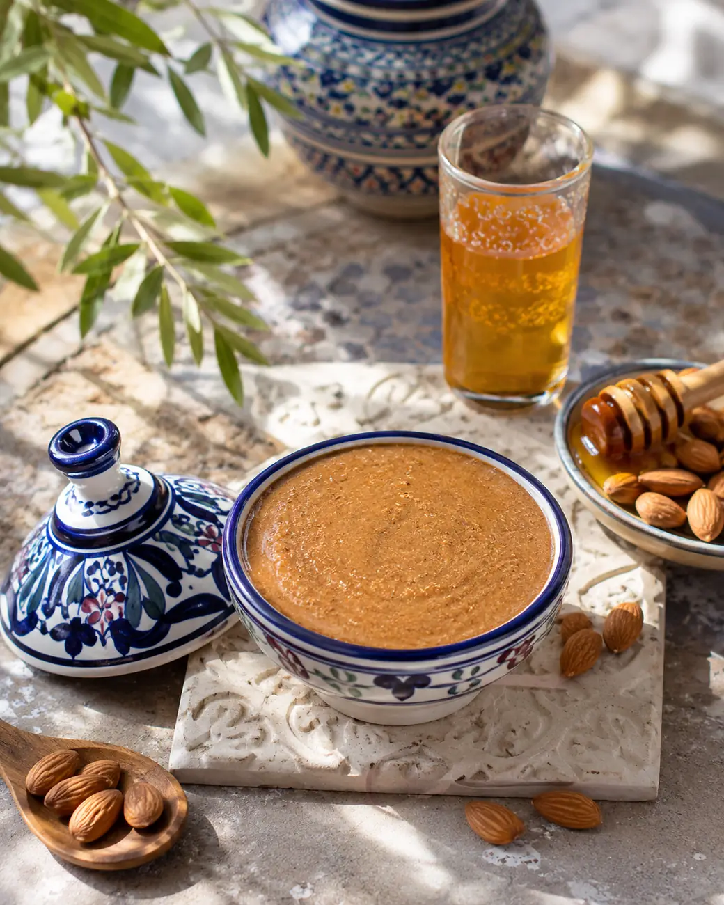 Amlou | Moroccan recipe image | ExoticMorocco Amlou almond and argan spread in a ceramic bowl — ExoticMorocco