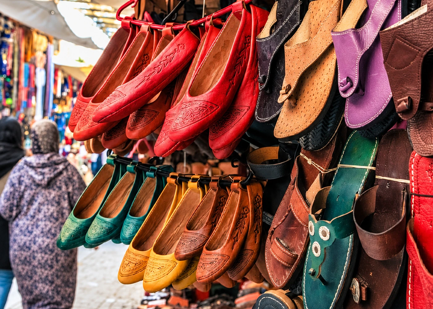 Leather slippers displayed in different colours
