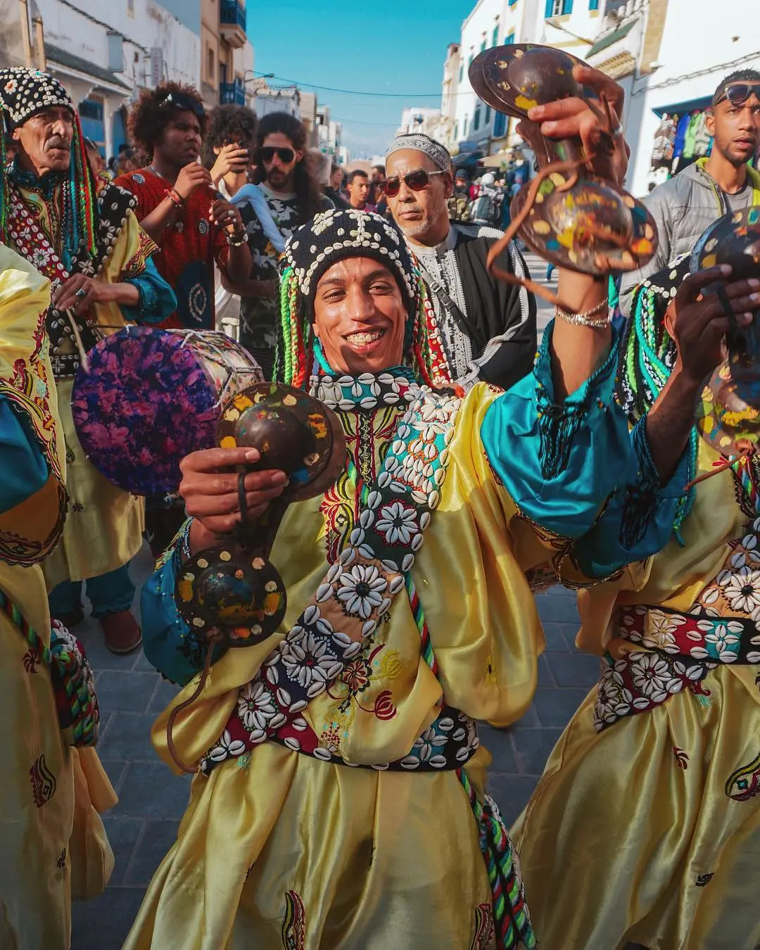 Festival musicians and celebrants in a Moroccan street procession