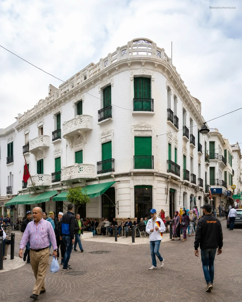 White façades and green shutters in the Ensanche of Tétouan.