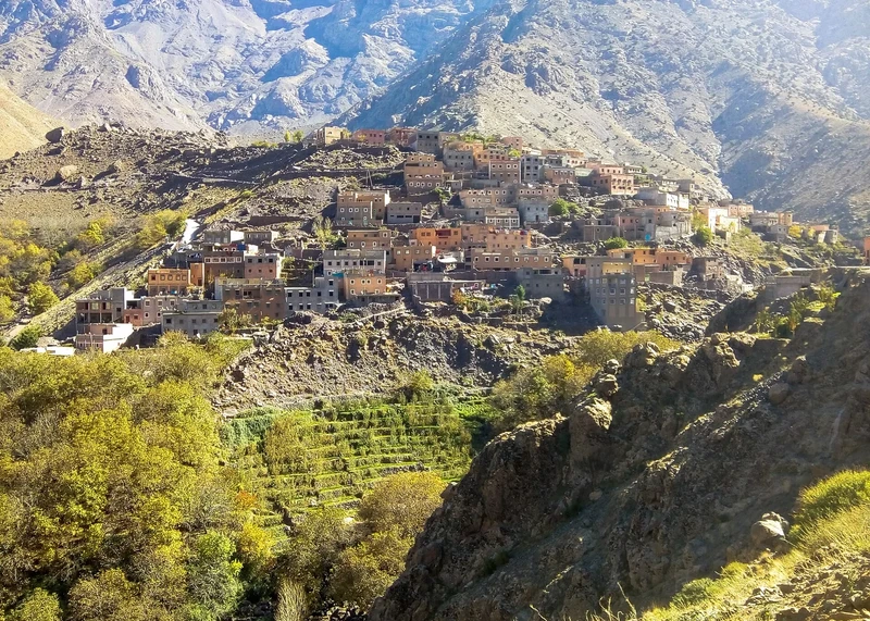 Imlil village in the High Atlas, with terraced fields and mountain slopes.