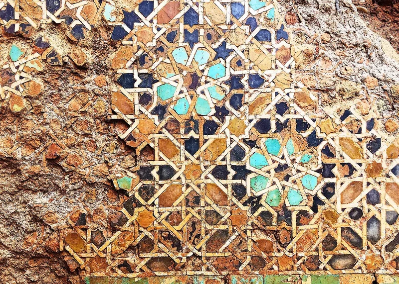 A surviving fragment of zellige at the Marinid mosque at Chellah.