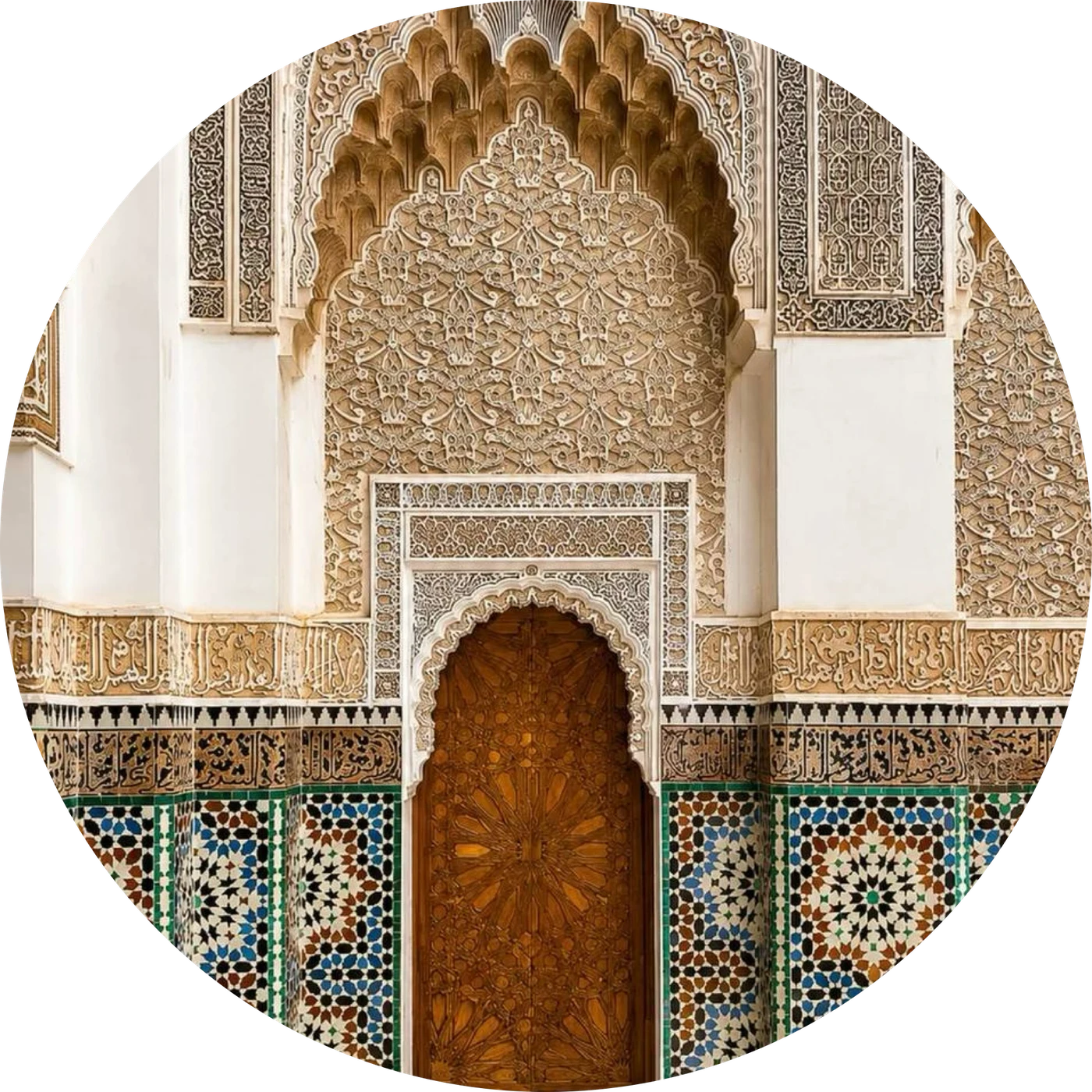 Moroccan heritage detail with zellige, carved wood and monumental door
