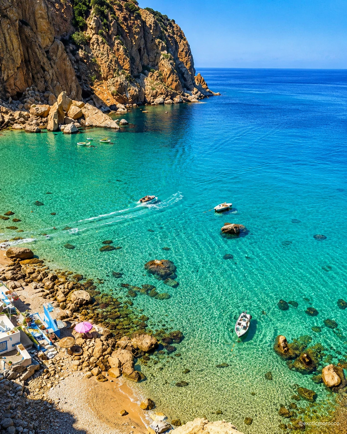 North Morocco and the Rif — turquoise cove with rocky shoreline and clear water