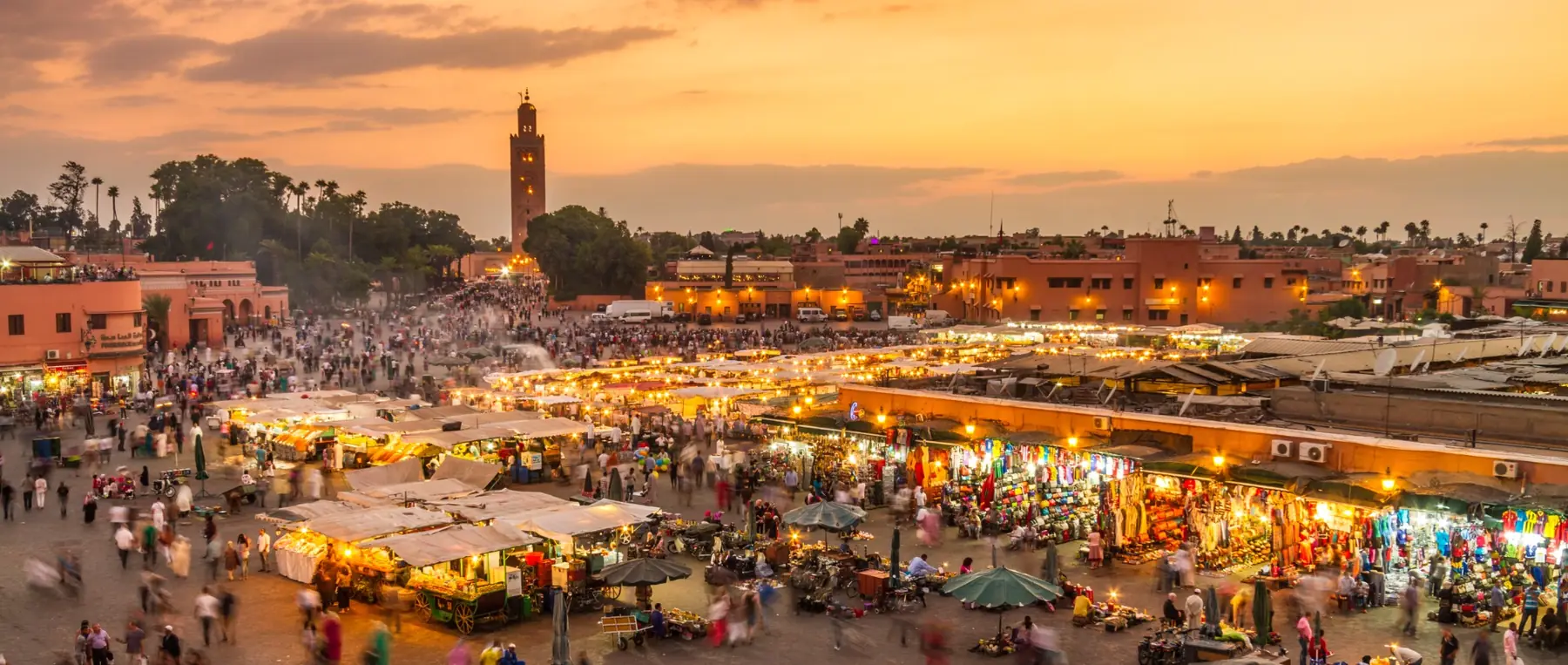 Jemaa el-Fna and the Koutoubia skyline at sunset in Marrakech