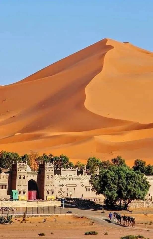 Southern Morocco Sahara dunes and kasbah