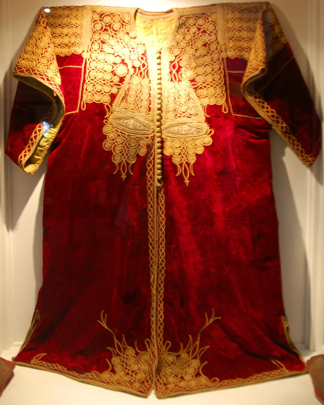 A red velvet caftan with gold-coloured embroidery displayed at the Bahia Palace, Marrakech. Photograph: Luc Viatour / Lucnix.be.