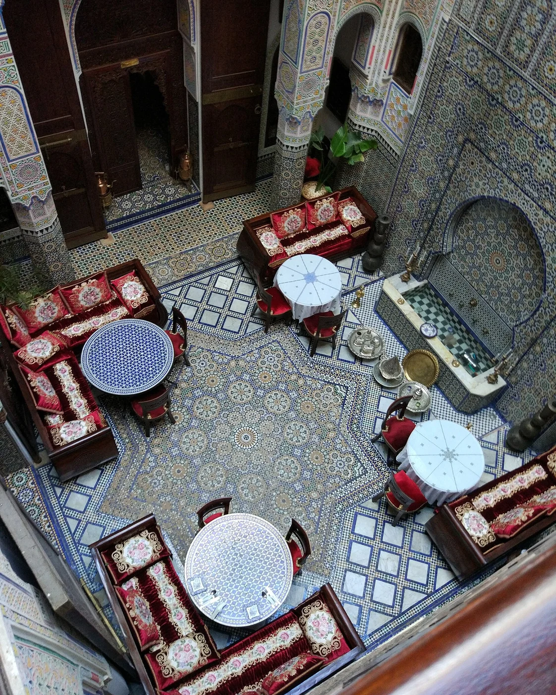 A courtyard in Fez viewed from above, showing rooms arranged around a shared centre.