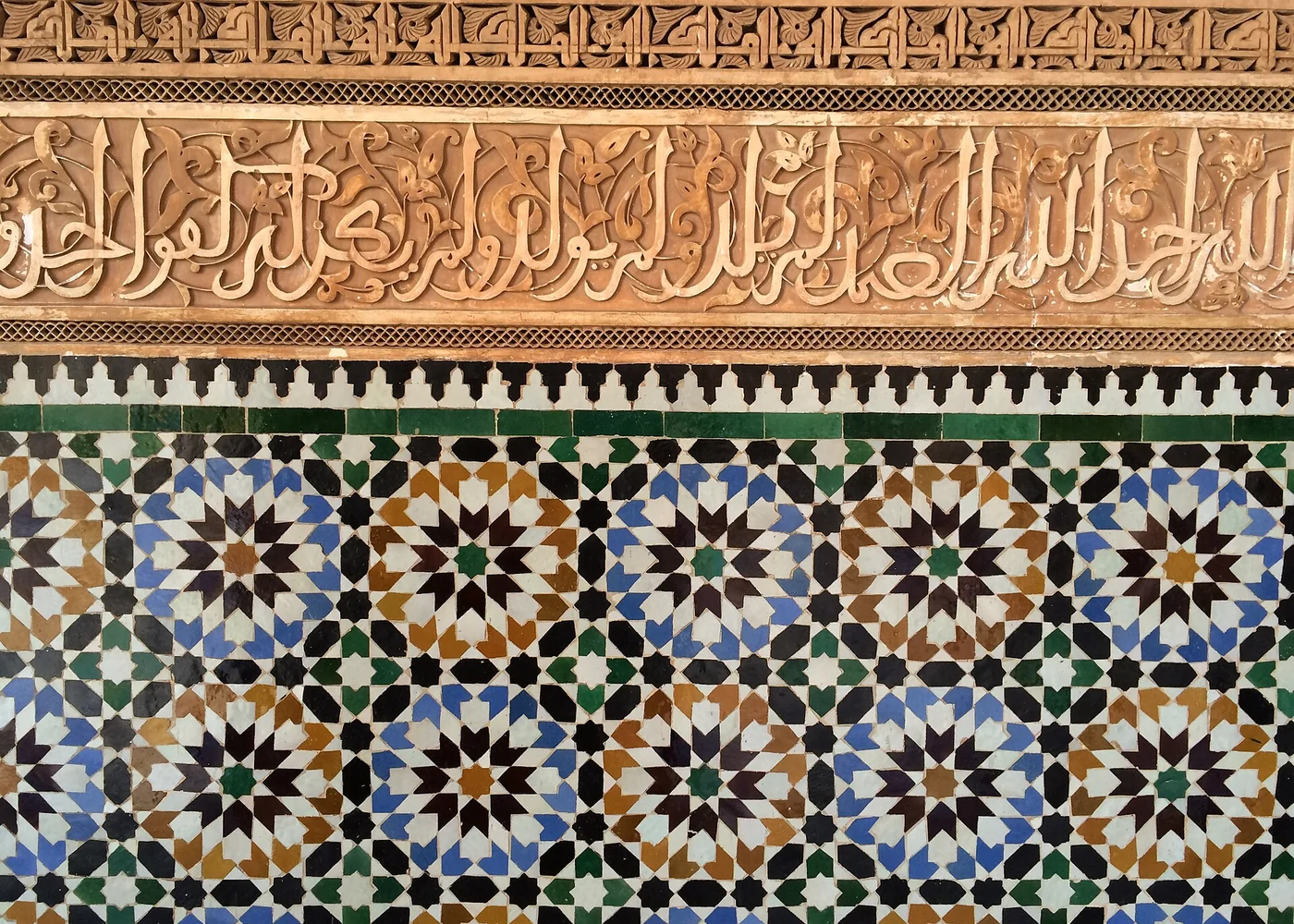 Zellige and carved decoration at the Ben Youssef Madrasa.
