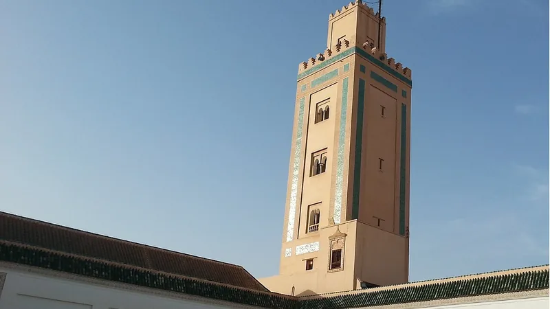 Ben Youssef Mosque and its minaret in Marrakech.