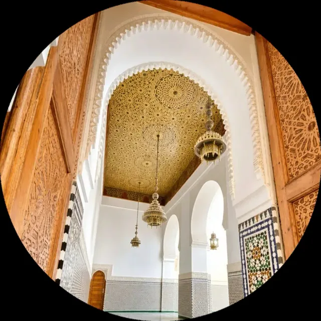 Moroccan architecture interior with zellige, carved doors and arches