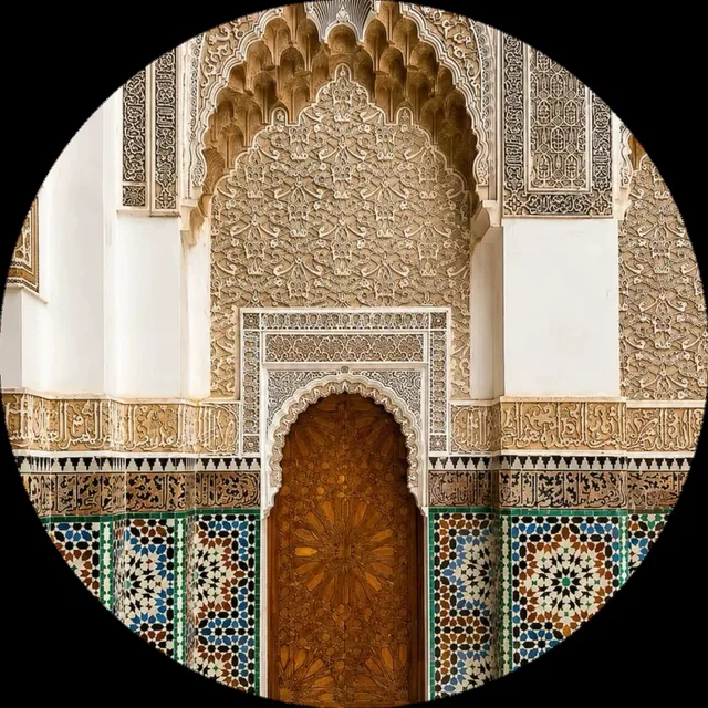 Moroccan heritage detail with zellige, carved wood and monumental door