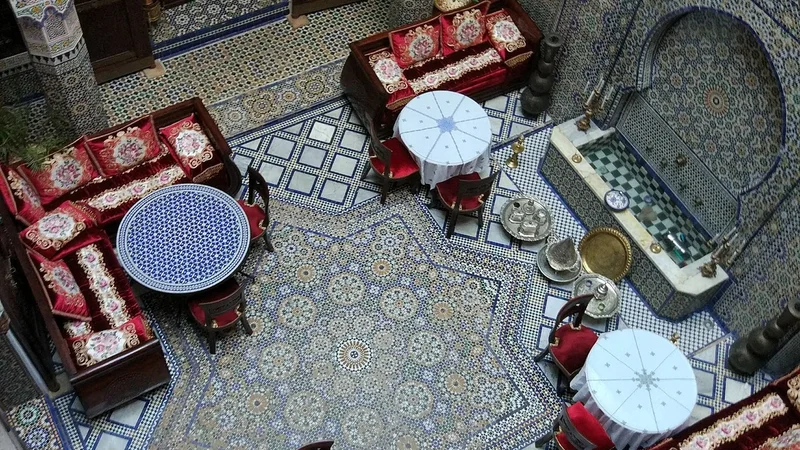 A courtyard in Fès viewed from above; a shared centre surrounded by rooms.