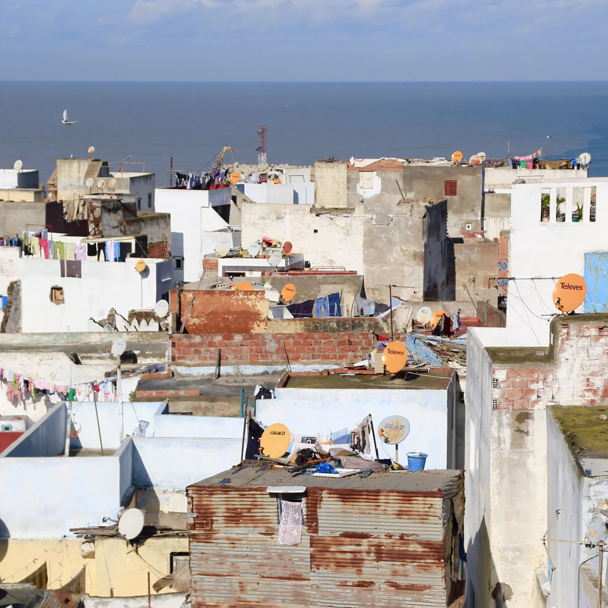 Urban rooftops meet the Mediterranean at Al Hoceima.