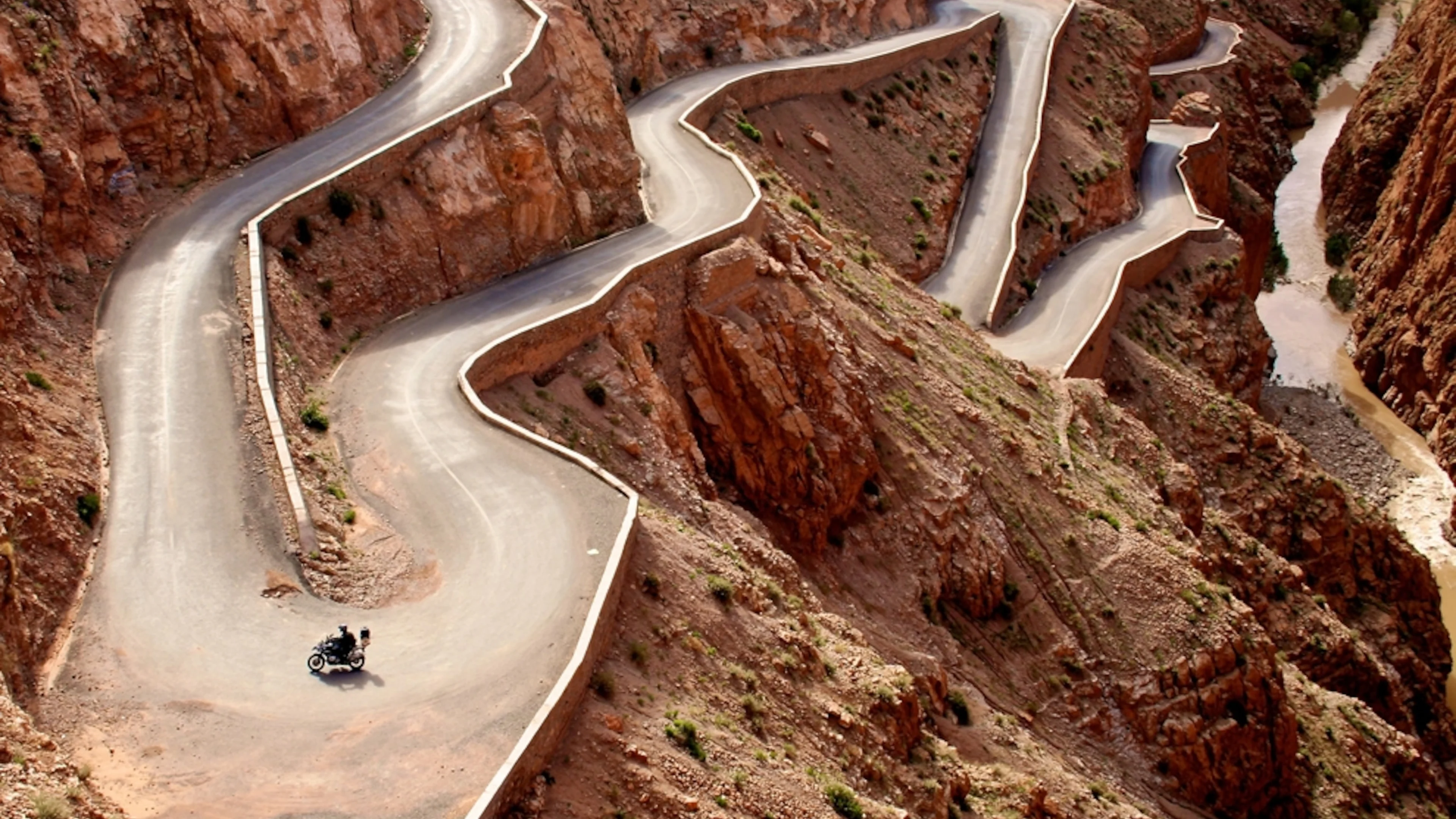 A winding road through the red-rock Dadès landscape