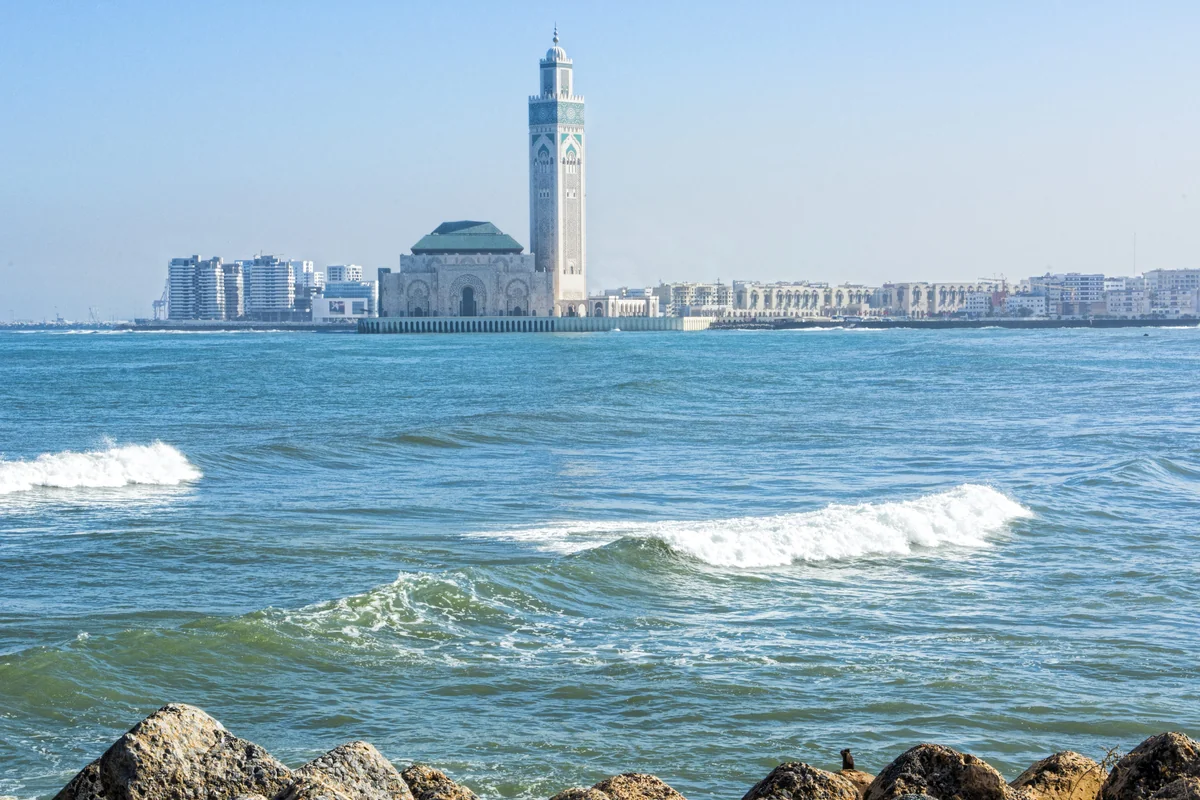 Hassan II Mosque seen across the Atlantic water in Casablanca