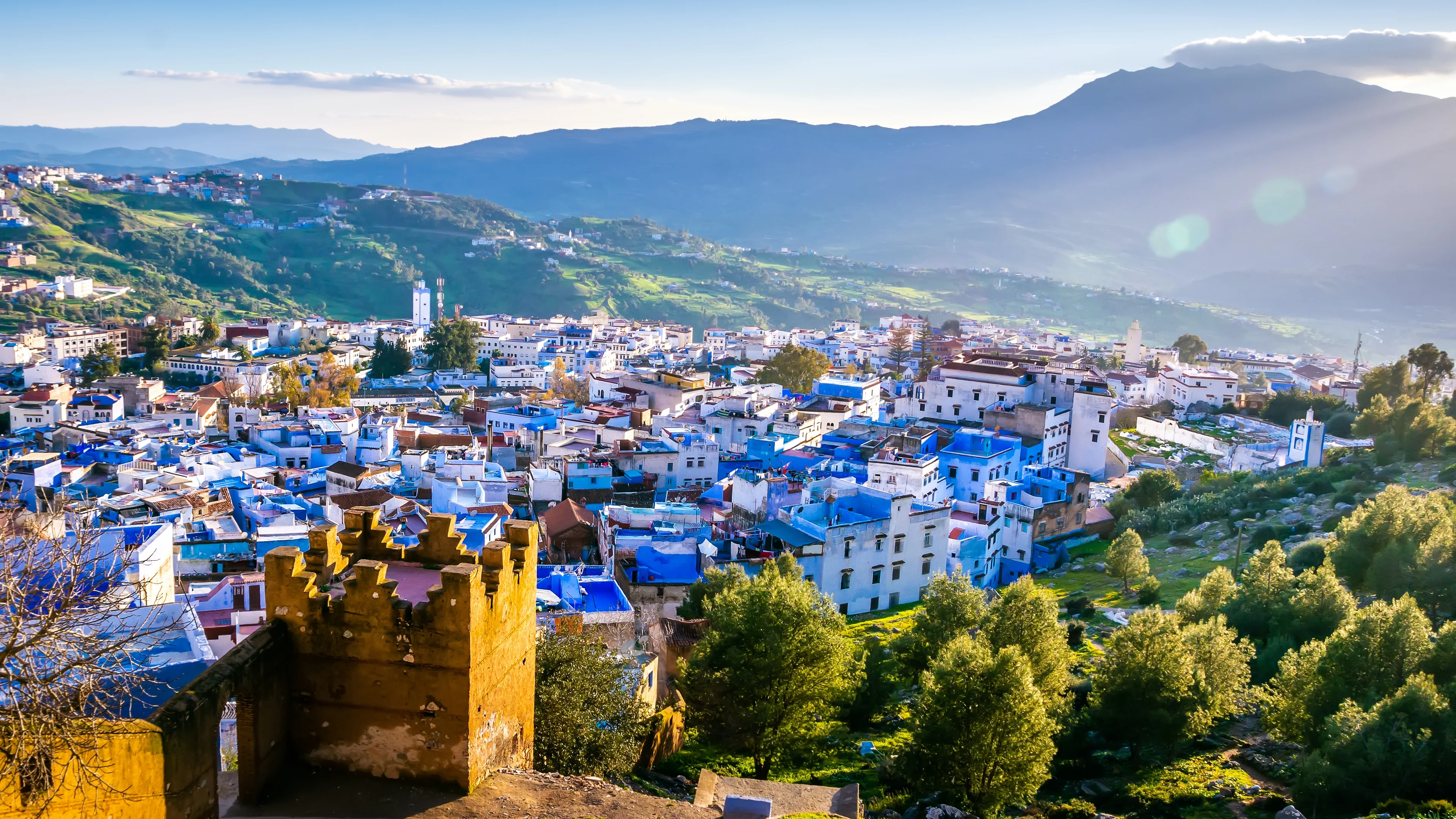 Chefchaouen spread across a mountainside in the Rif