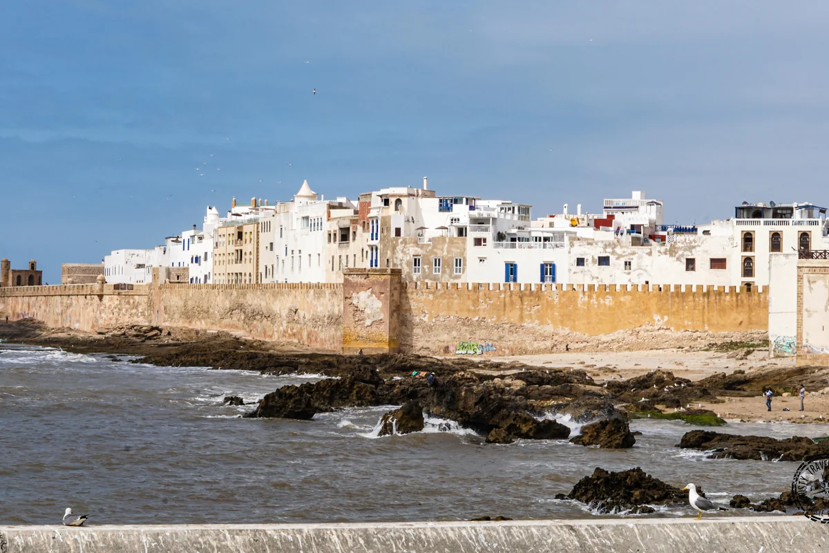 Whitewashed Essaouira houses behind the Atlantic ramparts