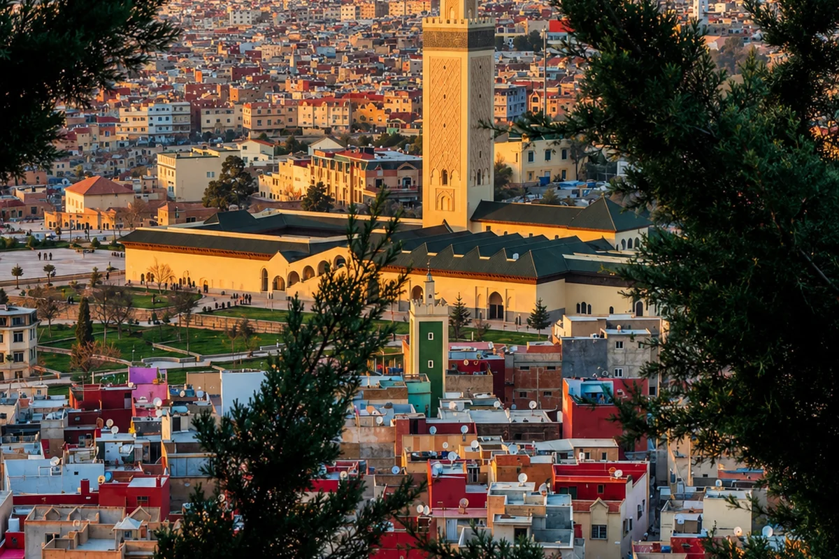 Azrou town and minaret rising below Middle Atlas hills