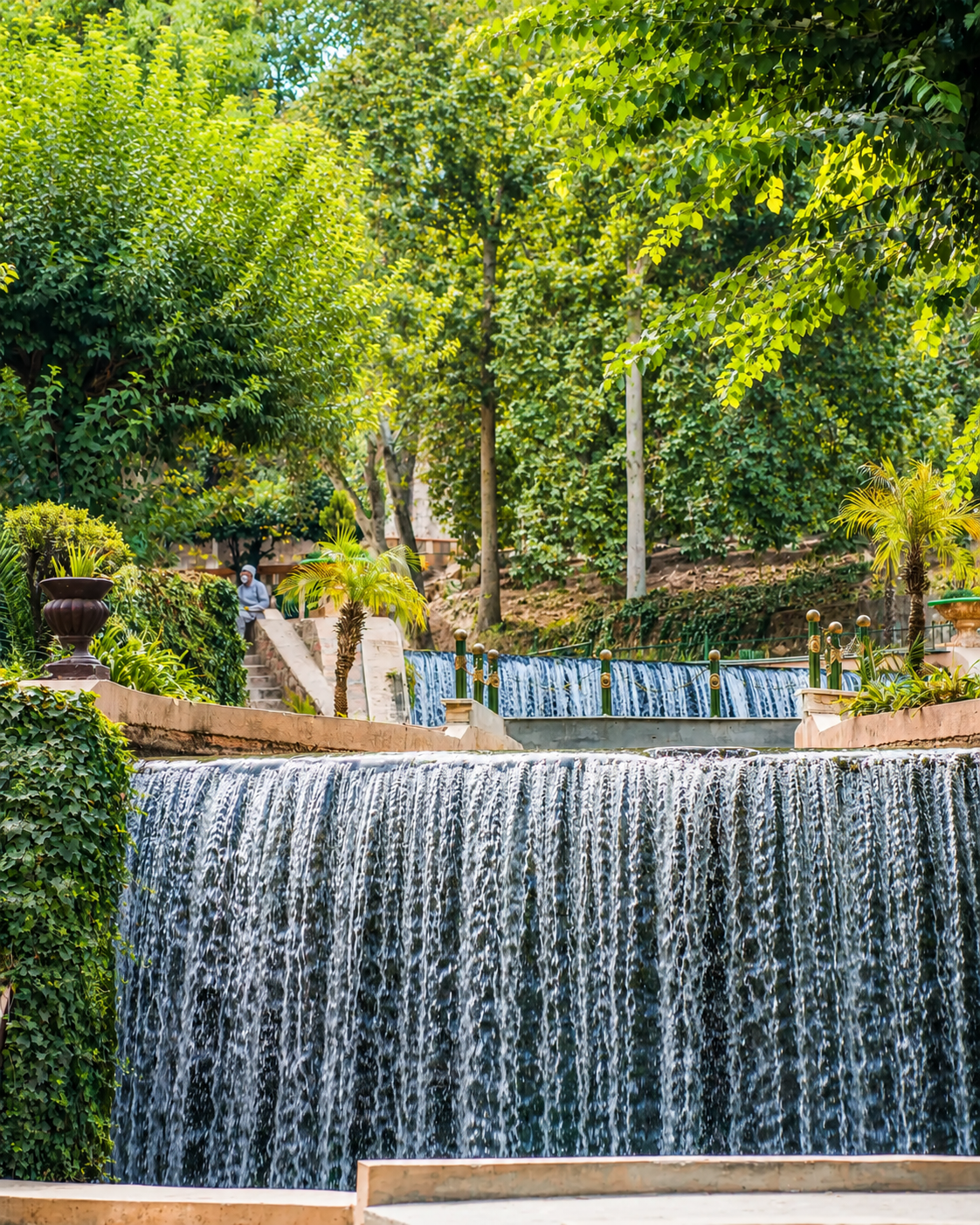 Cascading spring water and lush trees at Ain Asserdoun in Beni Mellal
