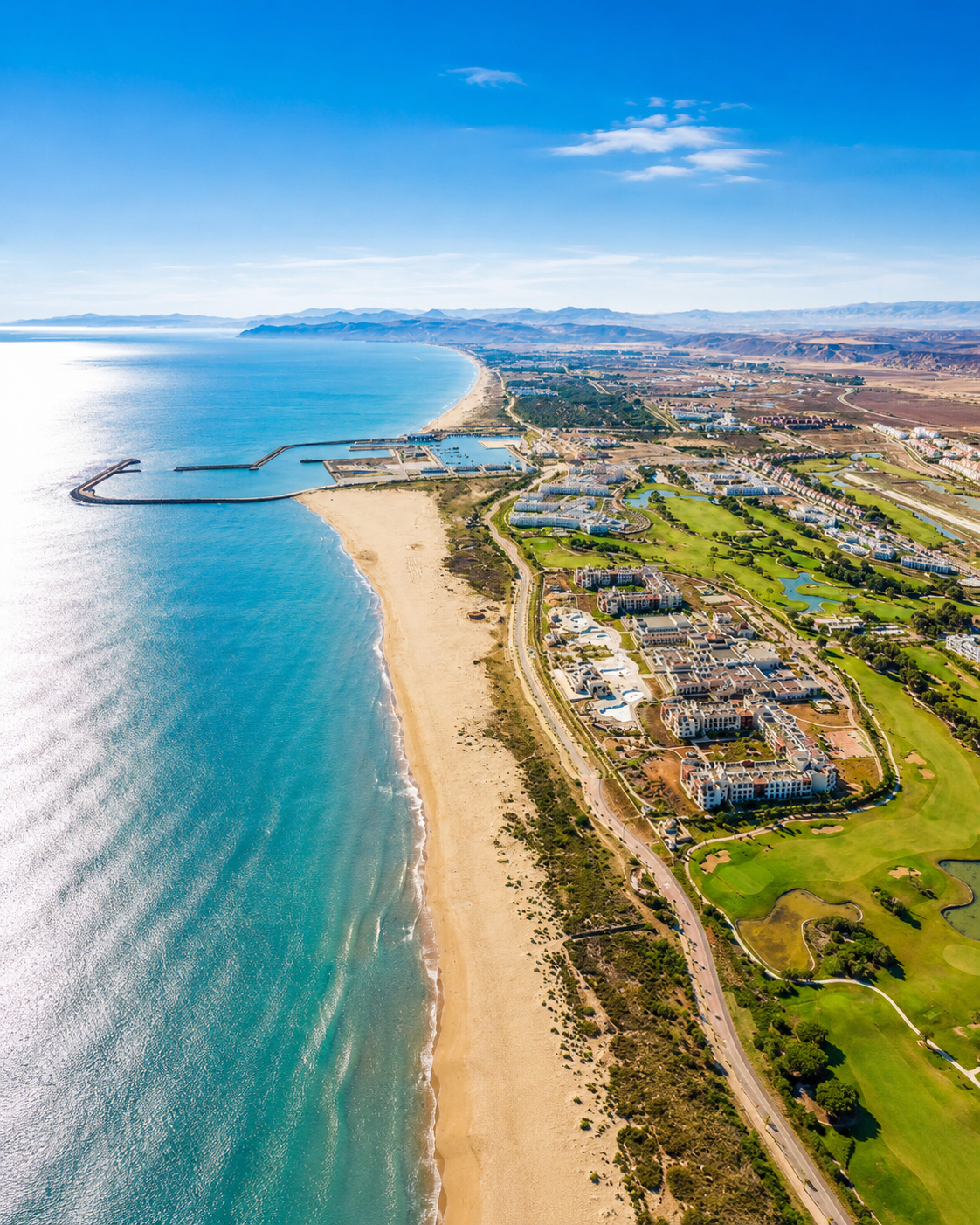 Aerial view of Saidia beach, marina and Mediterranean coastline
