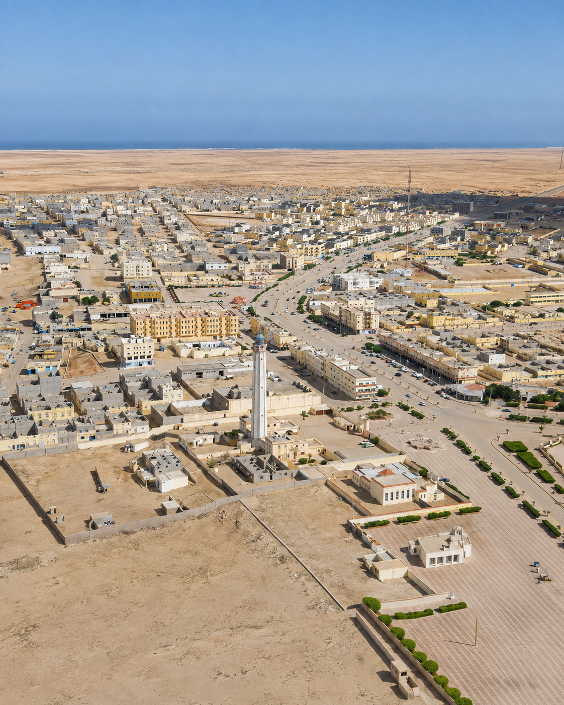 Boujdour streets and a mosque at the transition from city blocks to open desert