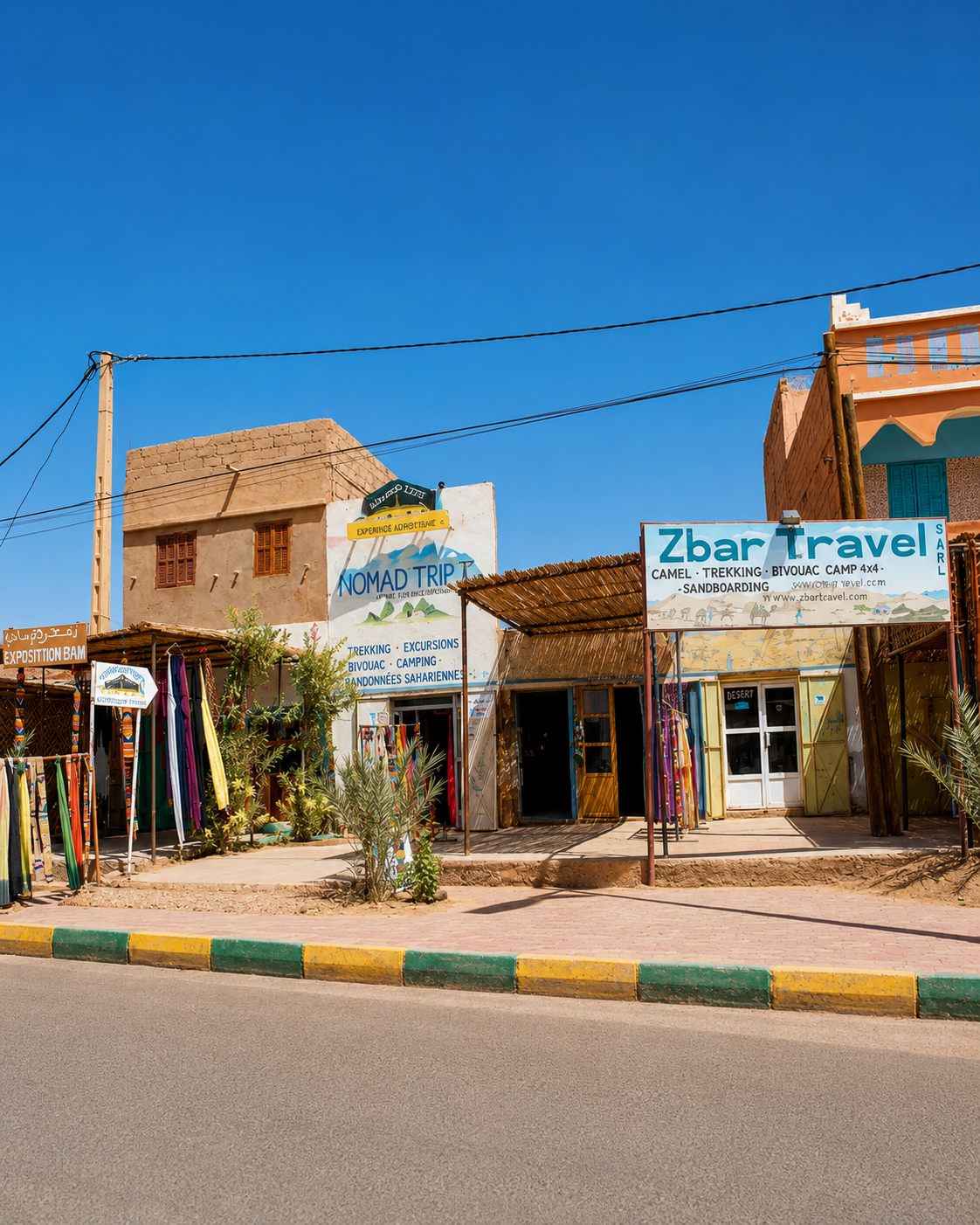 Local travel offices and everyday services beside the village road