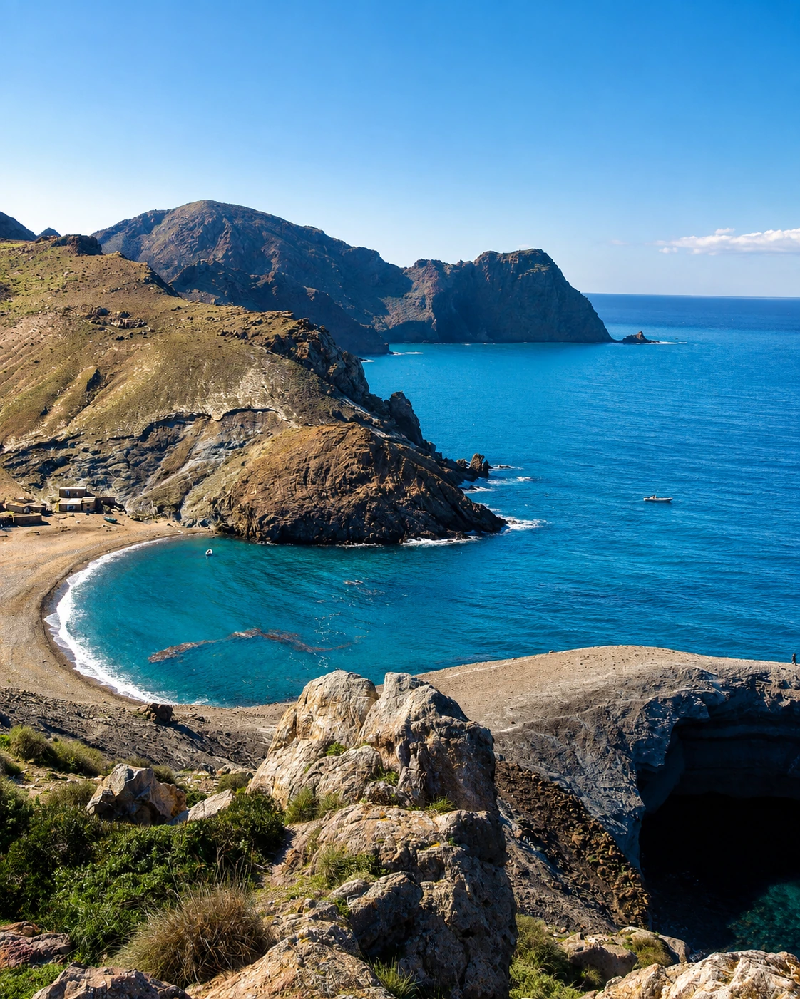 Rocky turquoise cove near Cap des Trois Fourches north of Nador