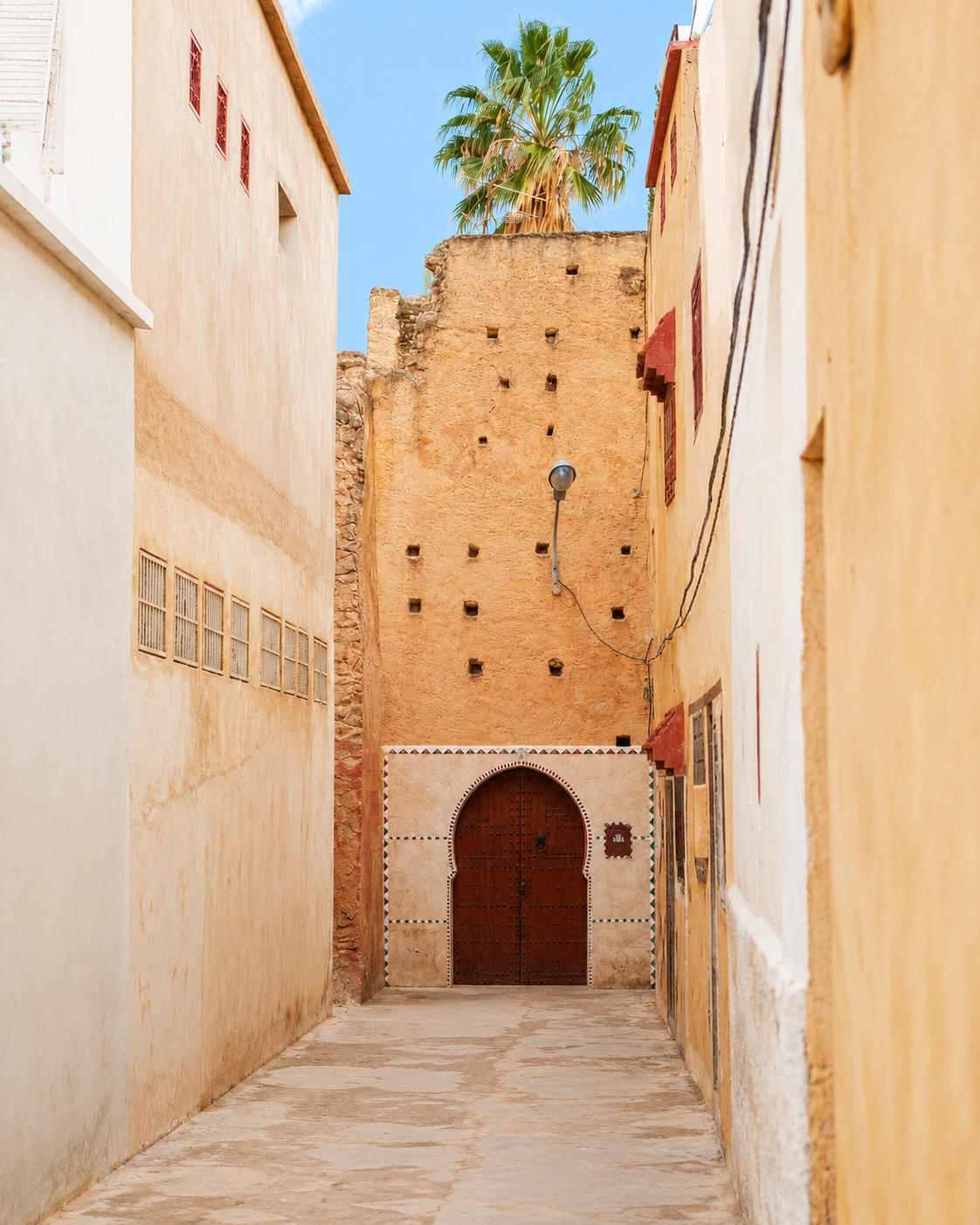 Oujda medina lane with market light and narrow passage