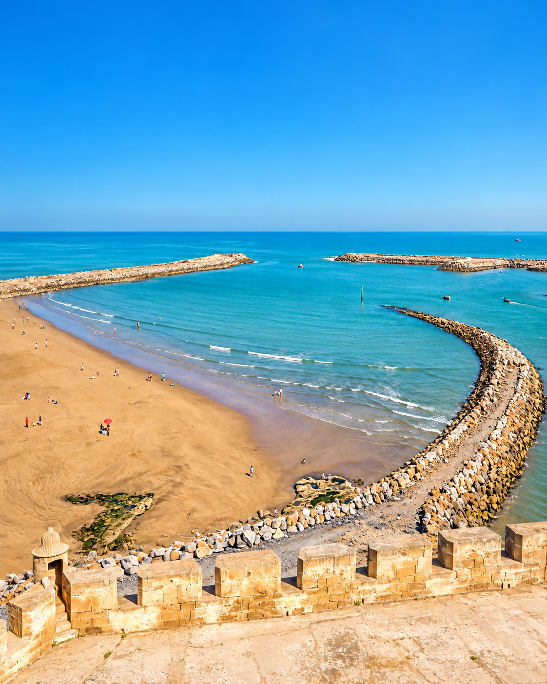 Salé beach and curved breakwaters at the Atlantic river mouth