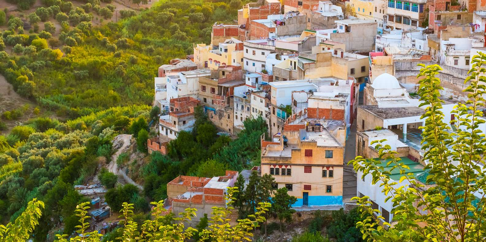 Hillside houses and green valley landscape in Bhalil near Sefrou
