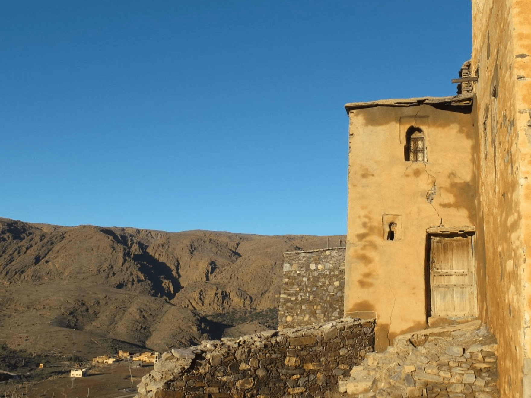 Stone houses and a mountain view at Kasbah Tizourgane in the Anti-Atlas