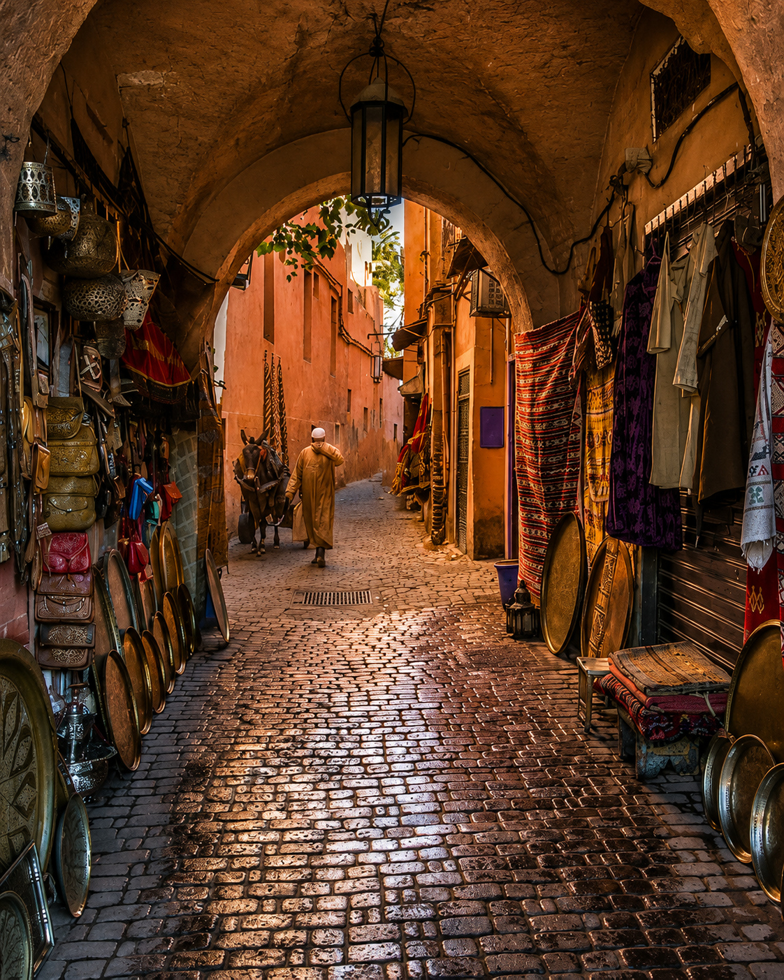 Sunlit medina street market in Taza