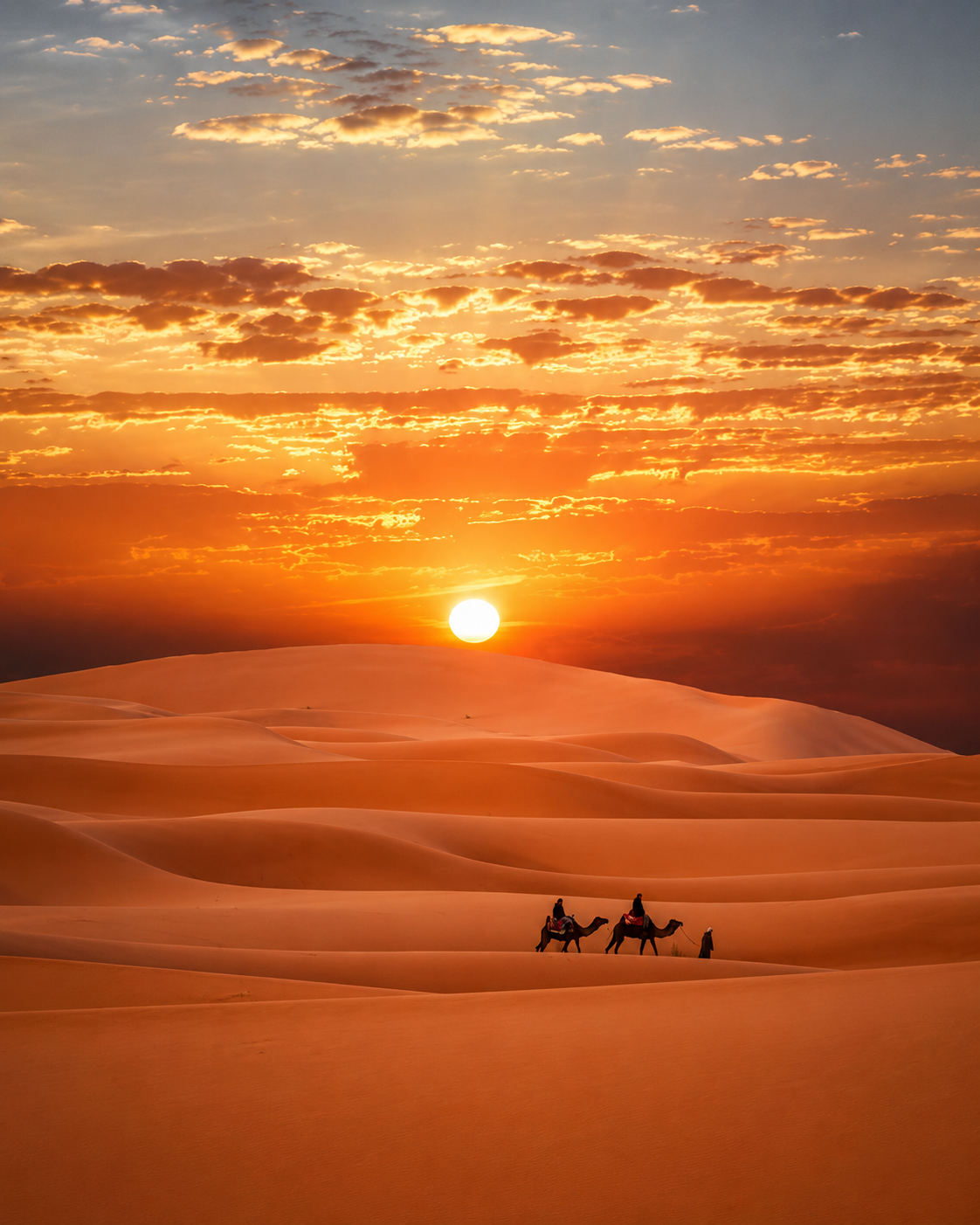 Sunset dunes marking the desert threshold beyond Zagora