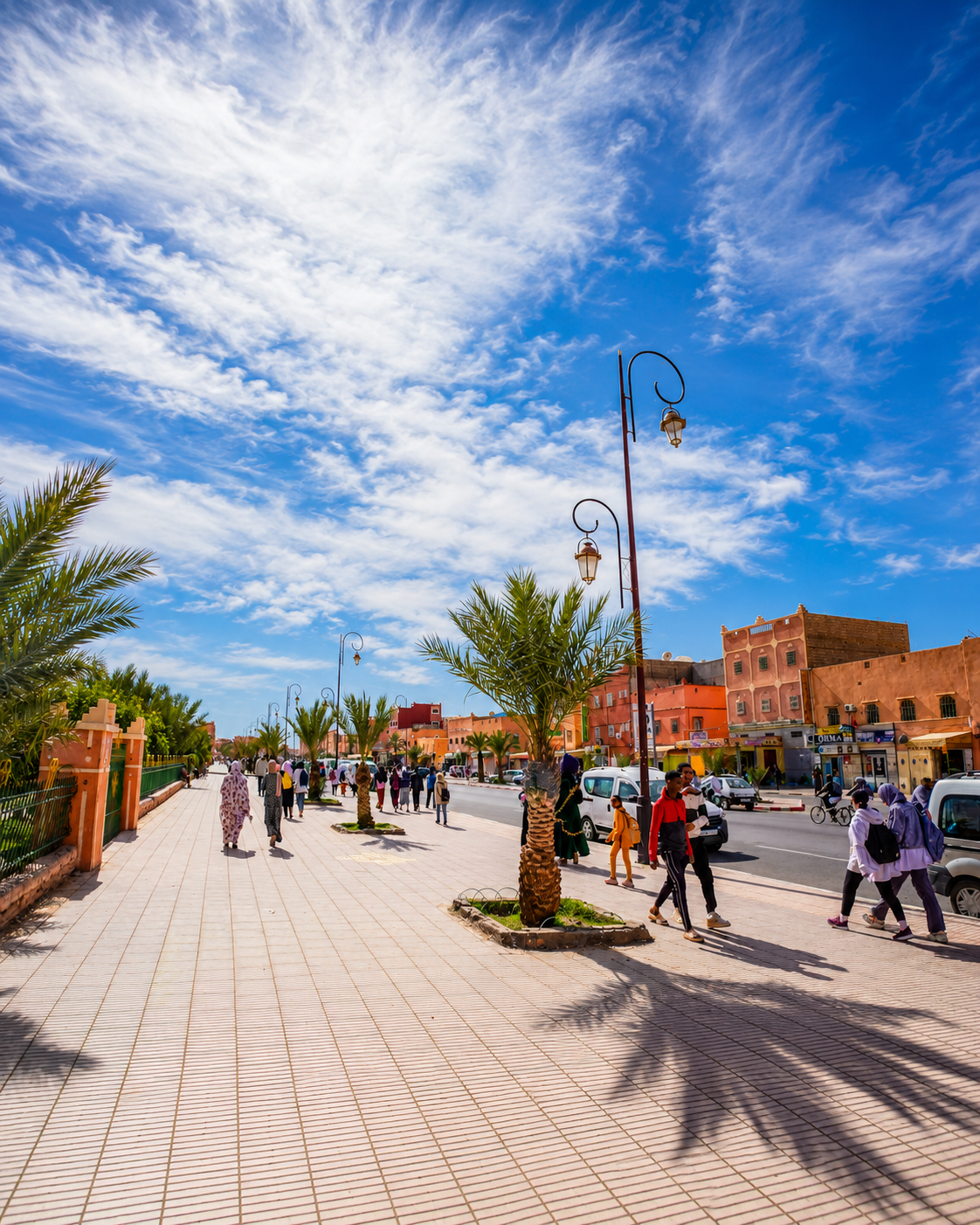 Narrow market alley with textiles and local goods in Zagora