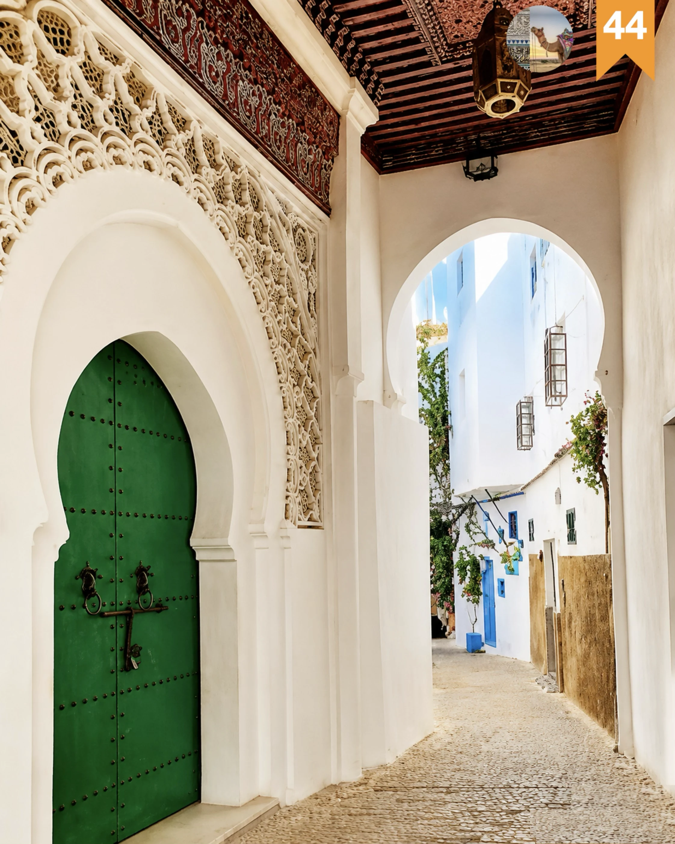 Tangier architectural passage with carved plaster, a green door and whitewashed lanes