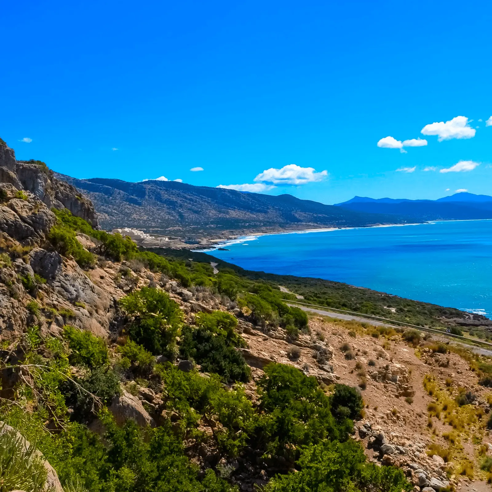 Rocky Cape Ghir coastline with Atlantic water and coastal road north of Agadir