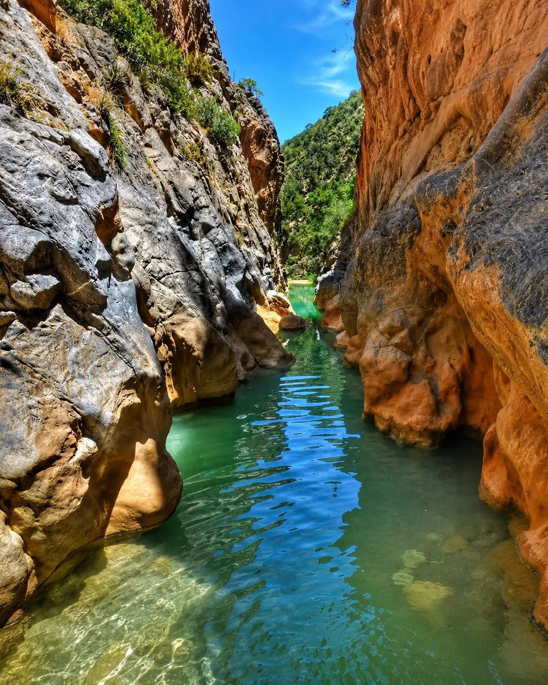 Bizi Gorges near Taza, with clear water between warm limestone walls