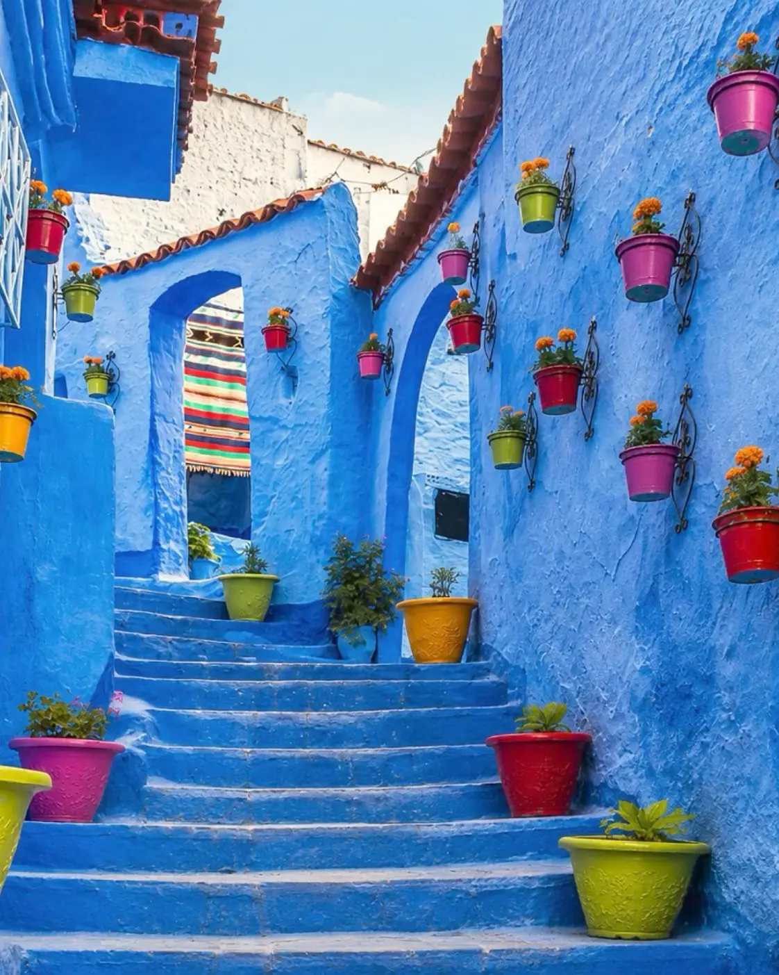 Blue stairway in Chefchaouen, a city gateway for visits towards Talassemtane